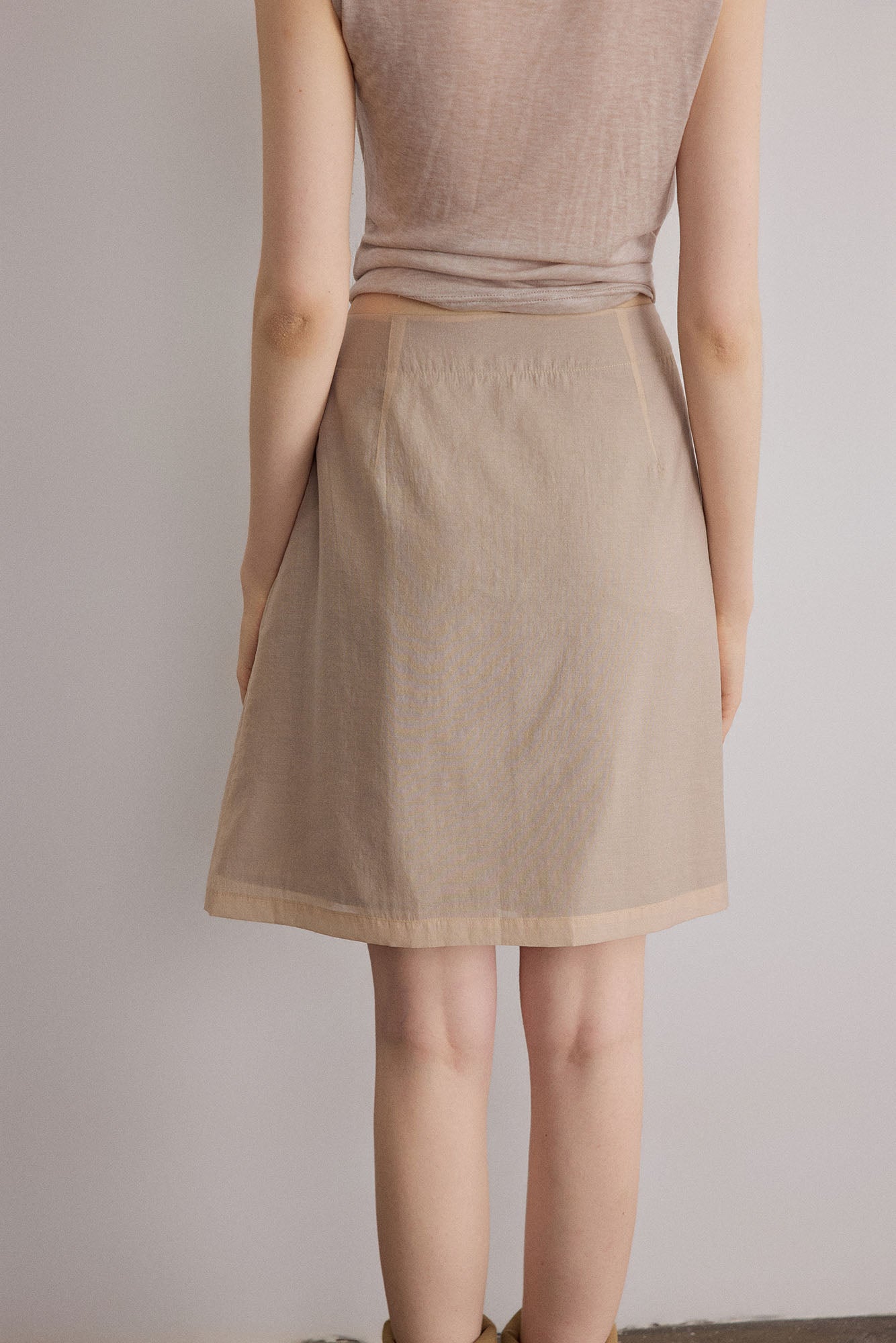 SAME FLOW Asymmetrical Layered Mini Skirt