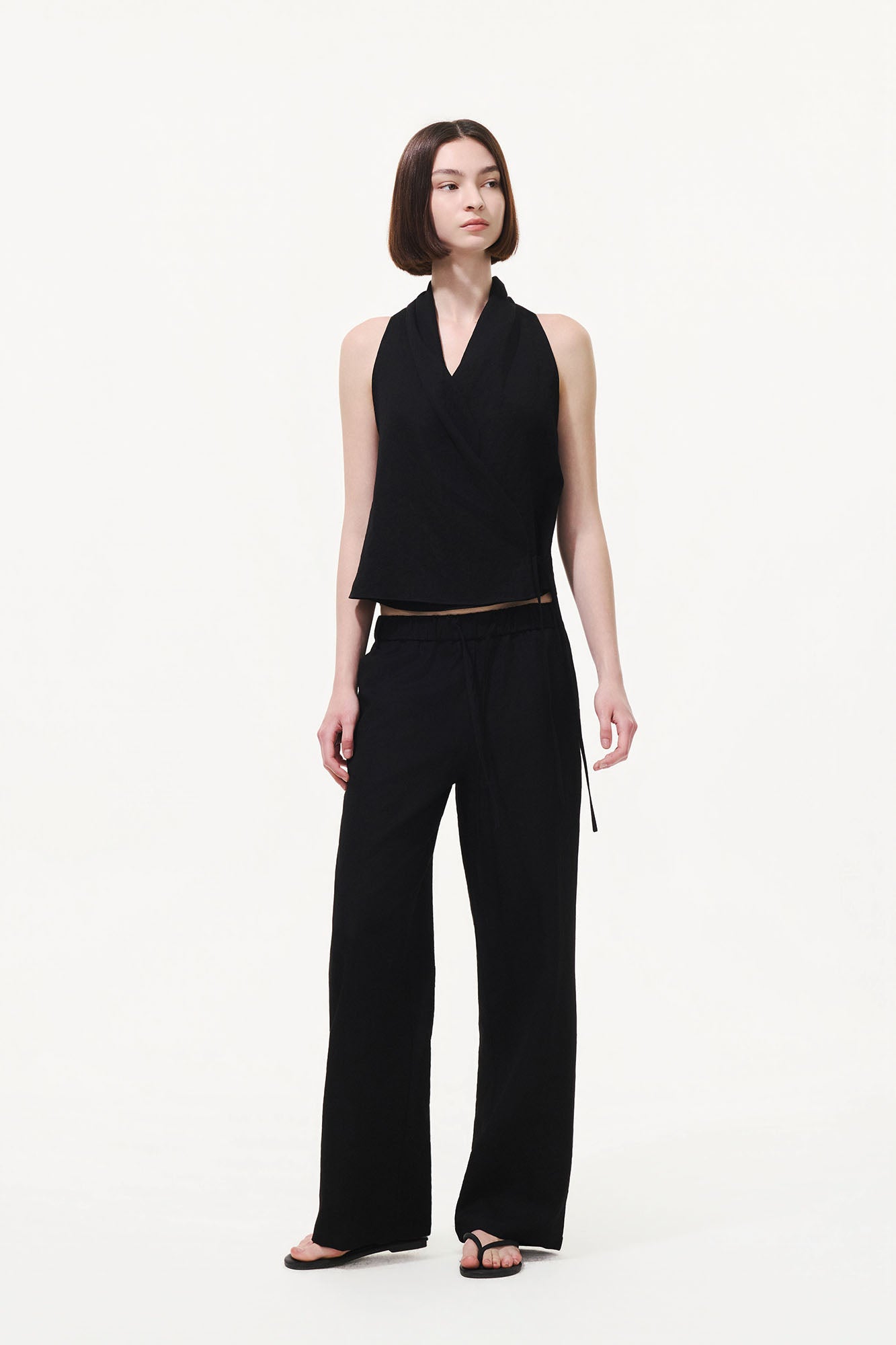 ARTIFICIAL WORLD Asymmetrical Wrap Halter Top