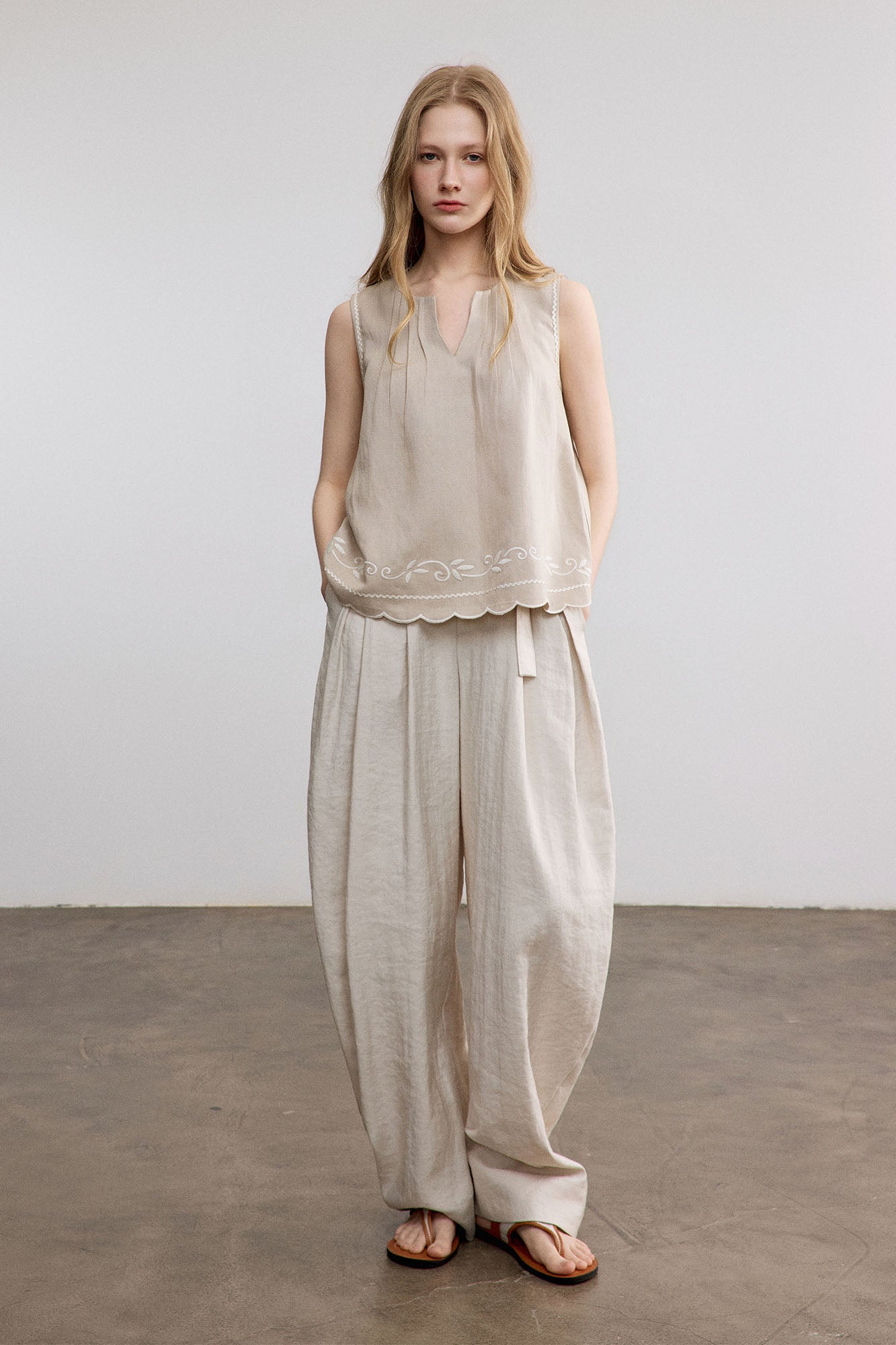 SAME FLOW Belted Pleated Oversized Barrel Pants
