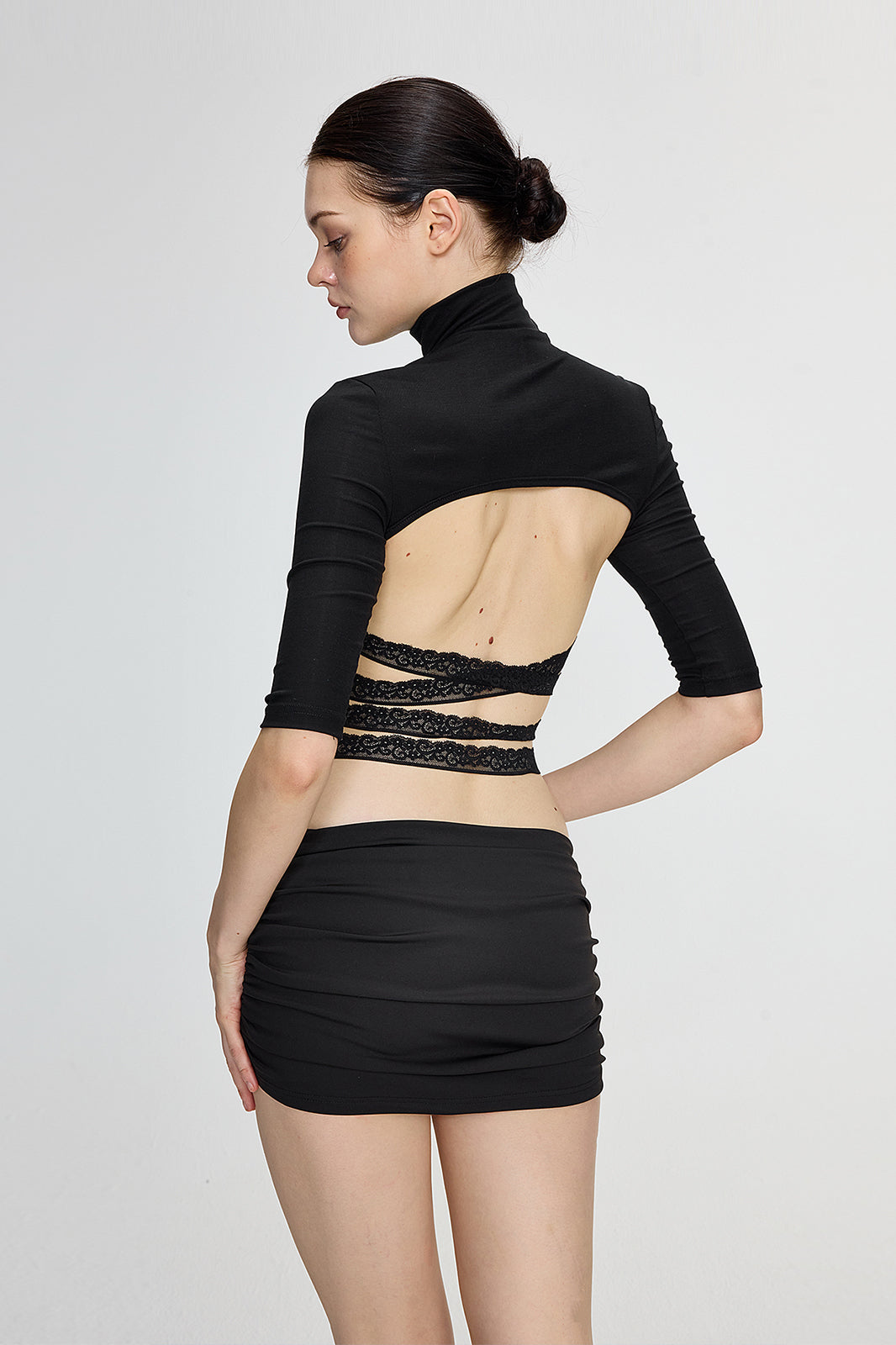 AE30 SAINT Lace Cut-Out Back High-Neck Top