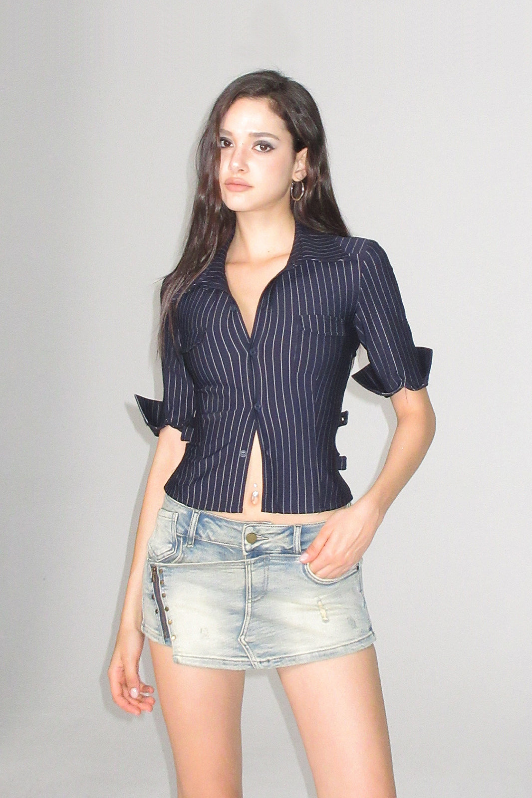 AE30 SAINT Pinstripe Buckled Backless Half Shirt
