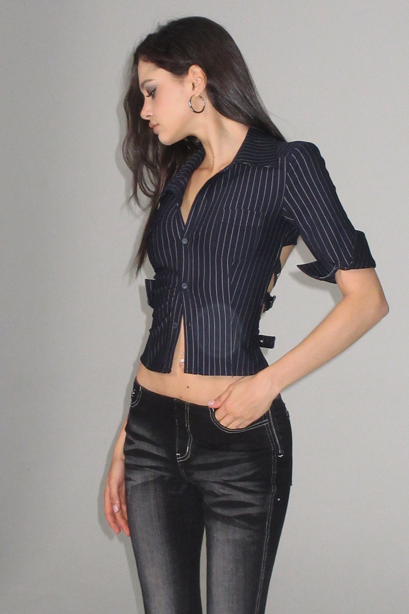 AE30 SAINT Pinstripe Buckled Backless Half Shirt