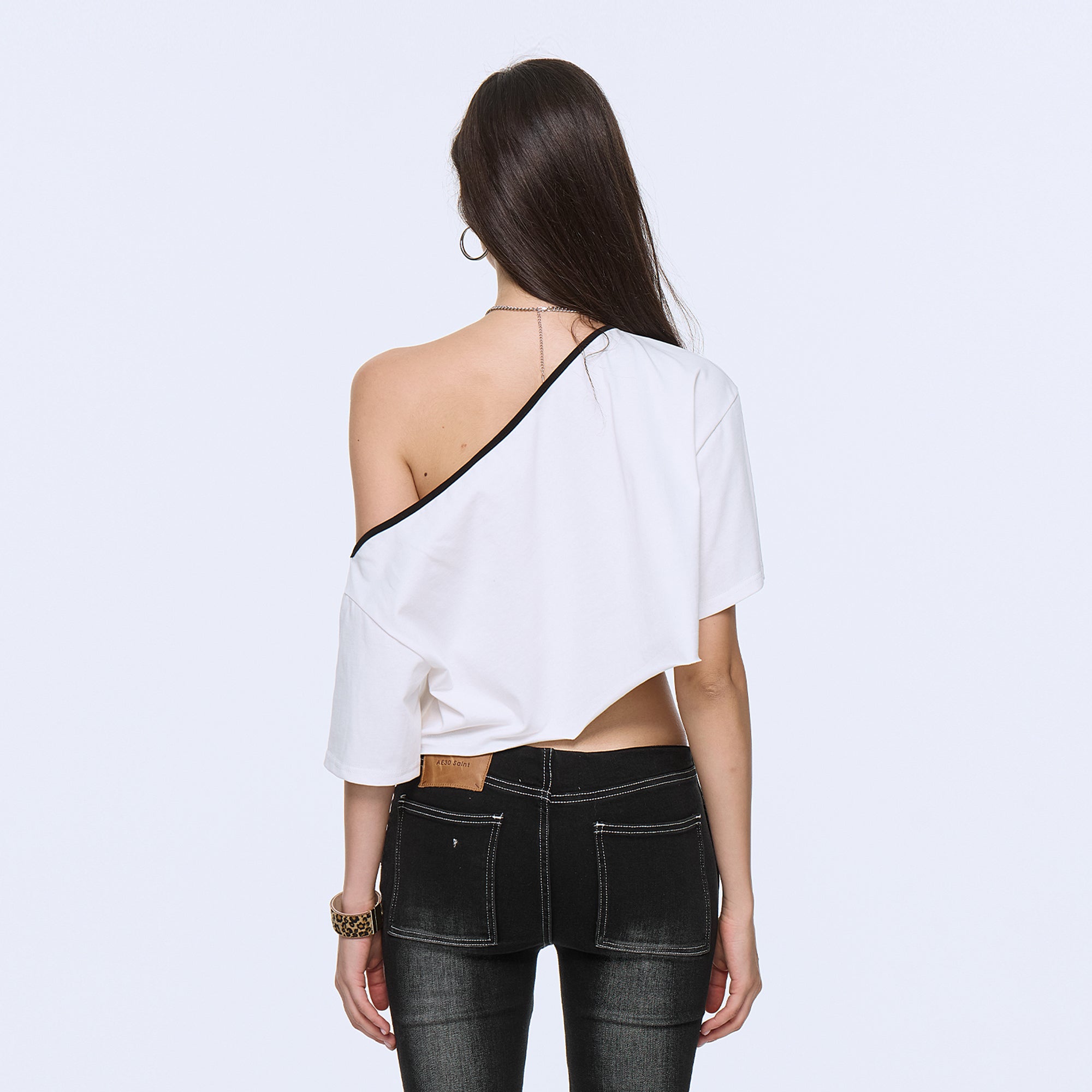 AE30 SAINT Photo Graphic Buckled Crop Tee