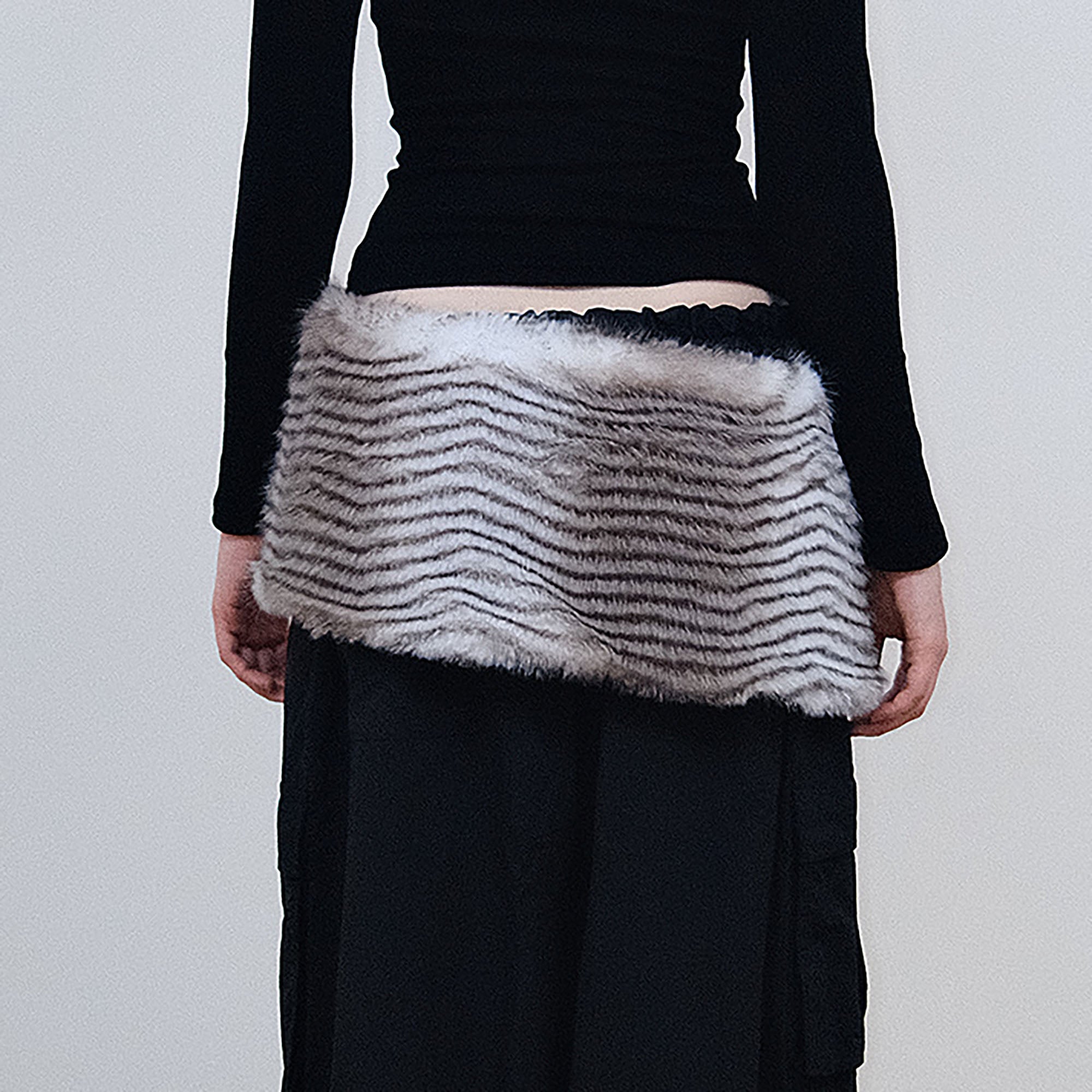 AE30 SAINT Faux Fur Snap Mini Skirt