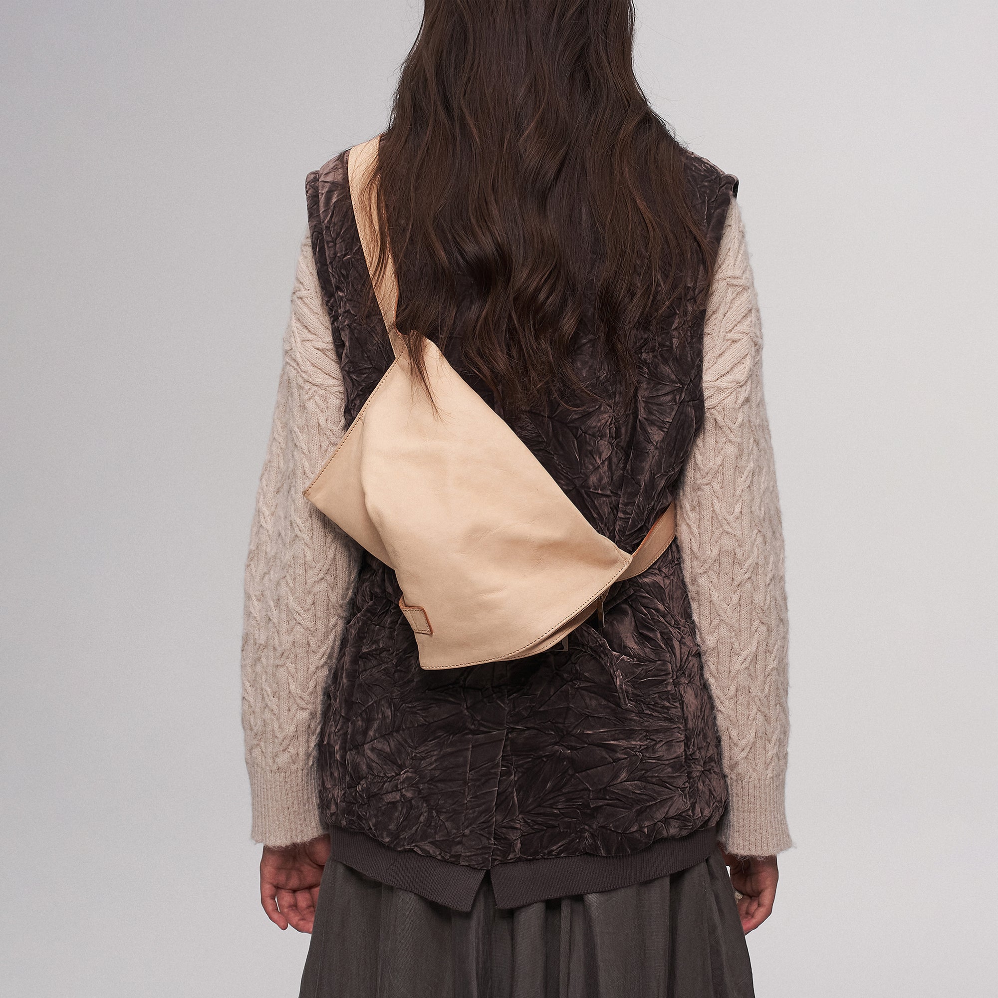 ILNya Nieternite Nifutur Asym Horsehide Buckled Sling Bag