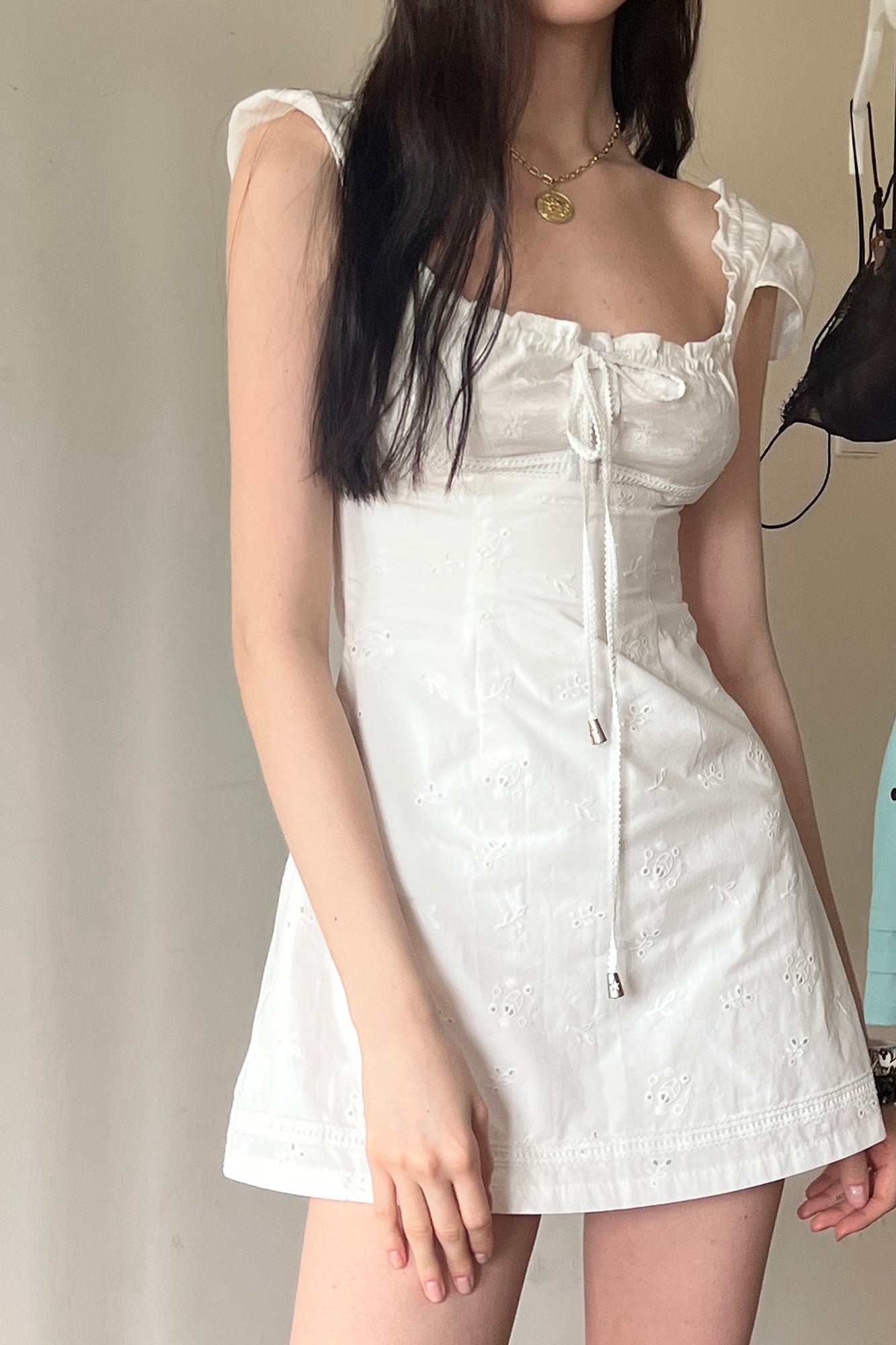 THE NEVERMORE Embossed Drawstring Mini Dress