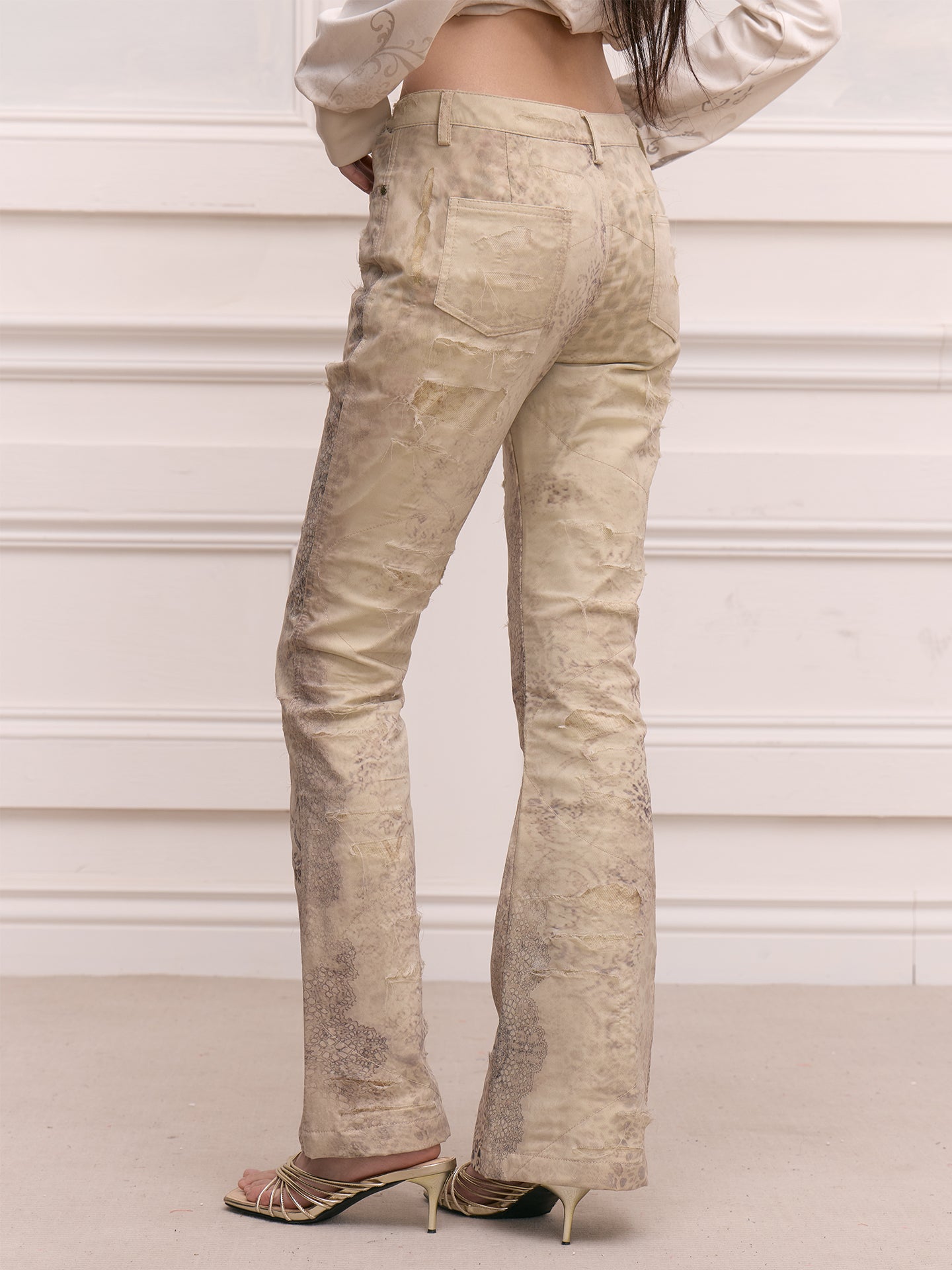 FAYCHUI Distressed Leopard Slim Flared Pants