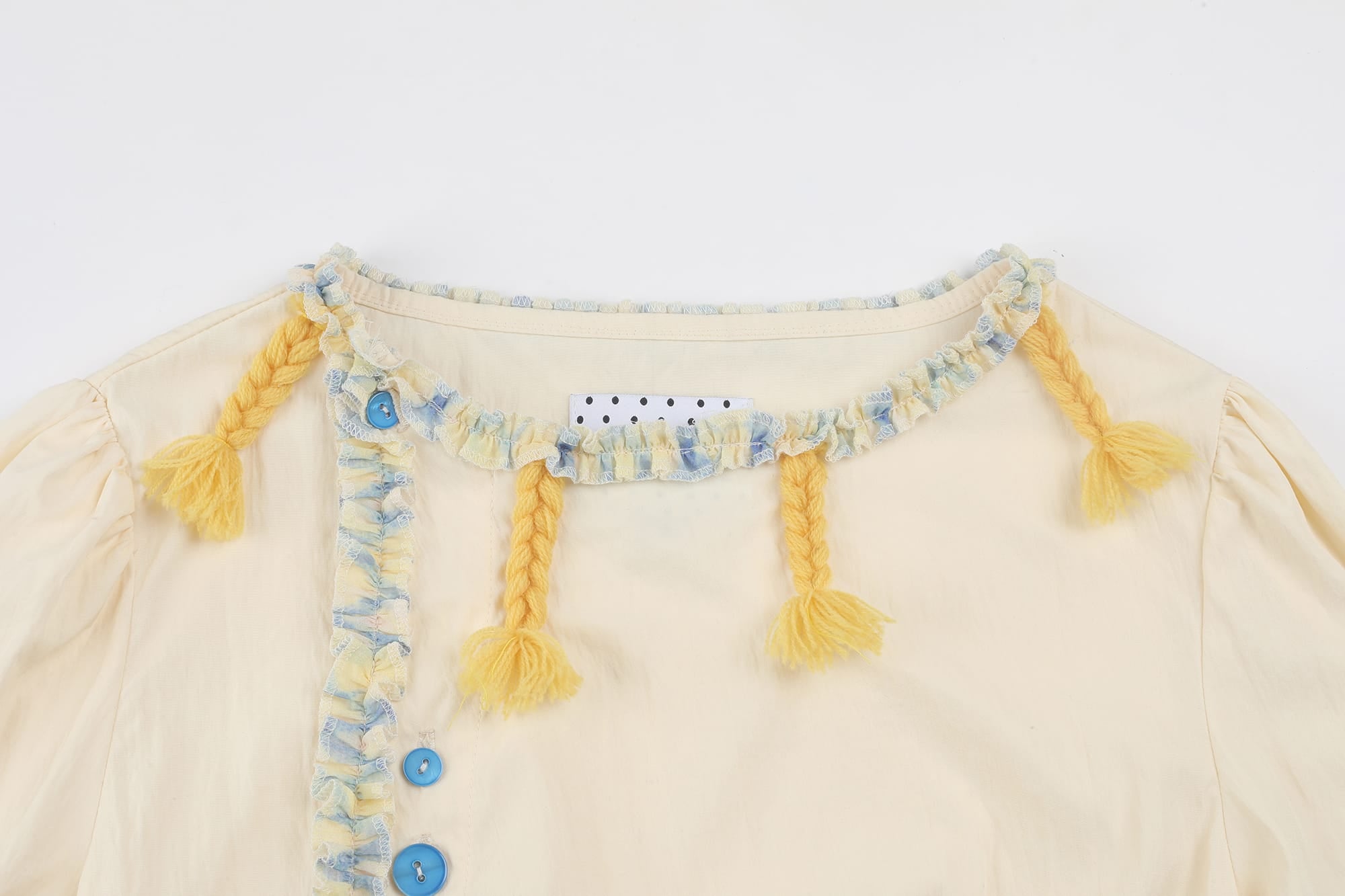 UNSOCIAL NIGHT Asymmetric Tassel-Trim Button Blouse