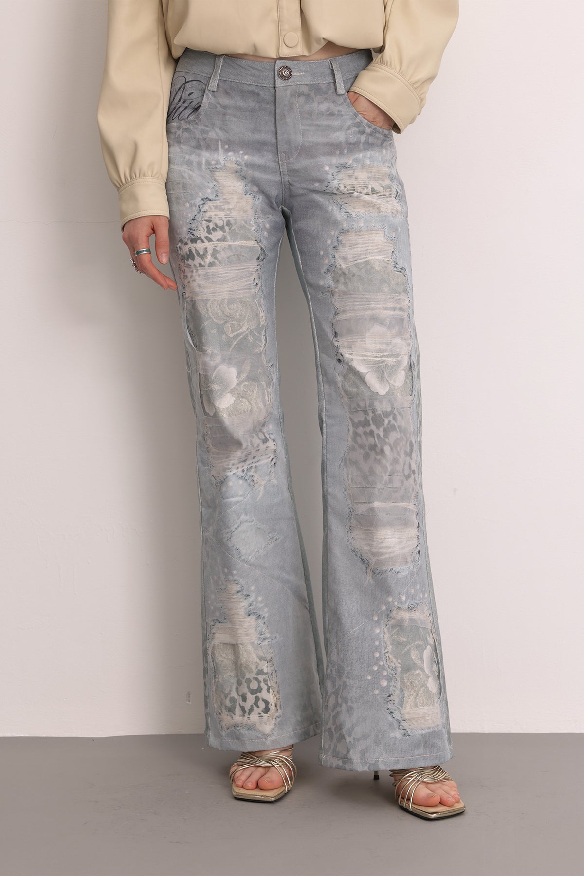 FAYCHUI Washed Leopard Distressed Mesh-Overlay Flared Jeans