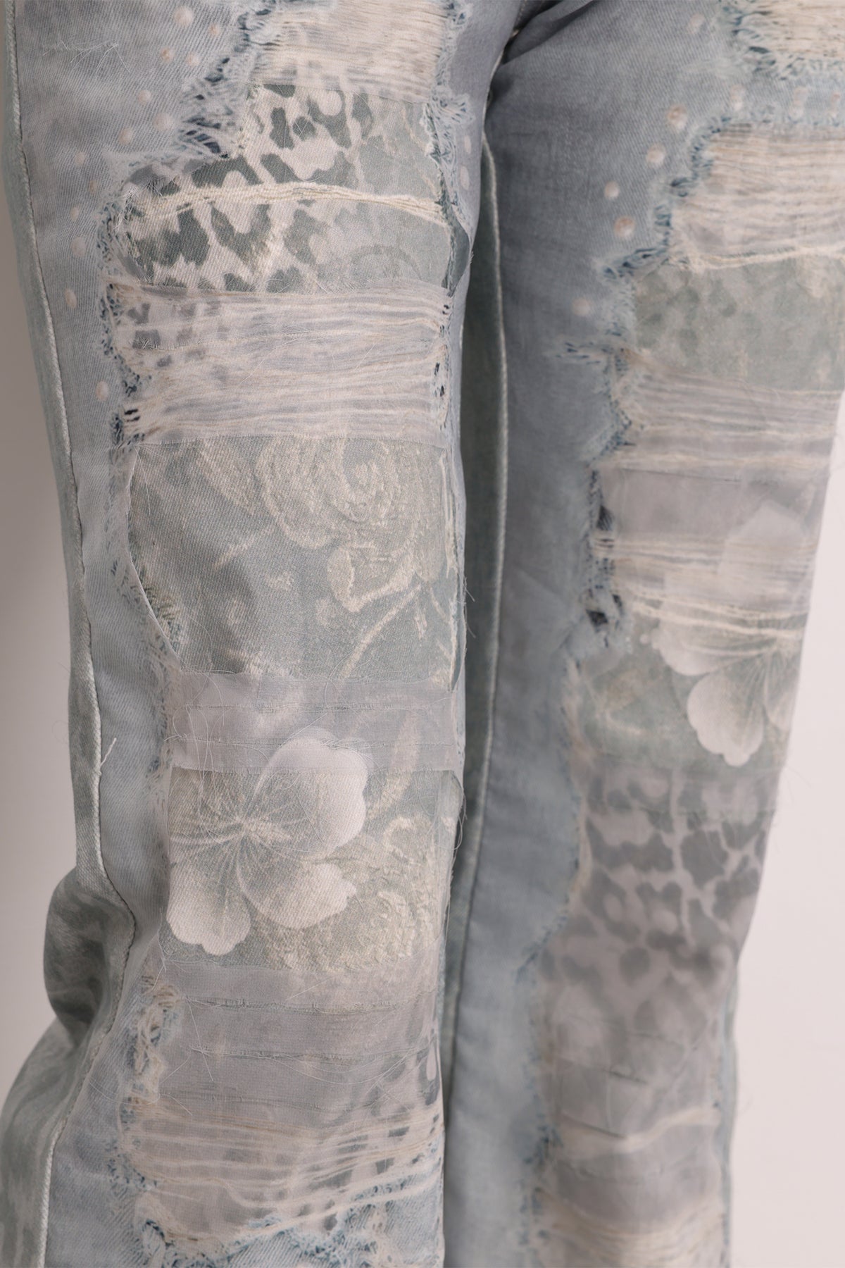 FAYCHUI Washed Leopard Distressed Mesh-Overlay Flared Jeans