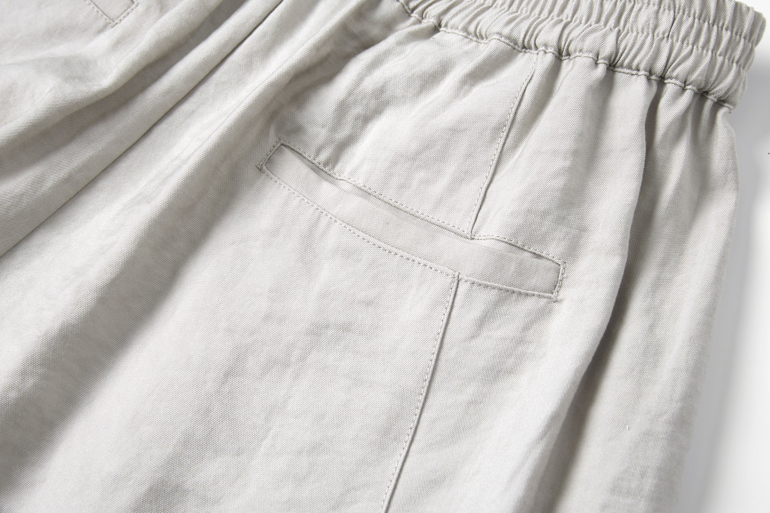 SAME FLOW Belted Pleated Oversized Barrel Pants