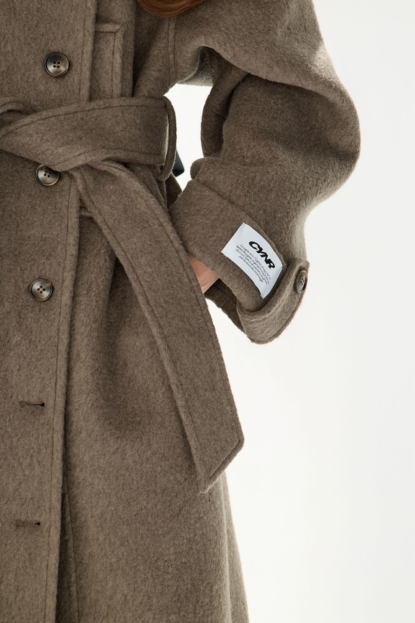 CYGNENOYR Modern Asymmetric Belted Longline Coat