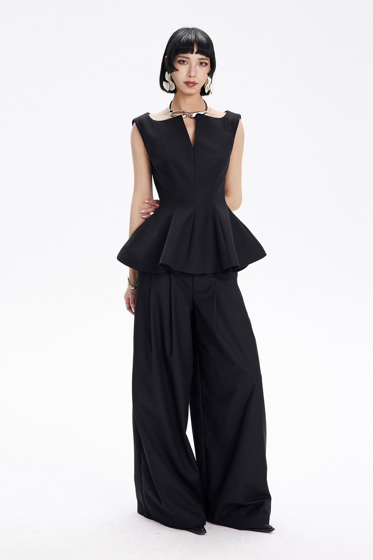 TINY IN STUDIO Sculptural Flared-Hem Tank Top