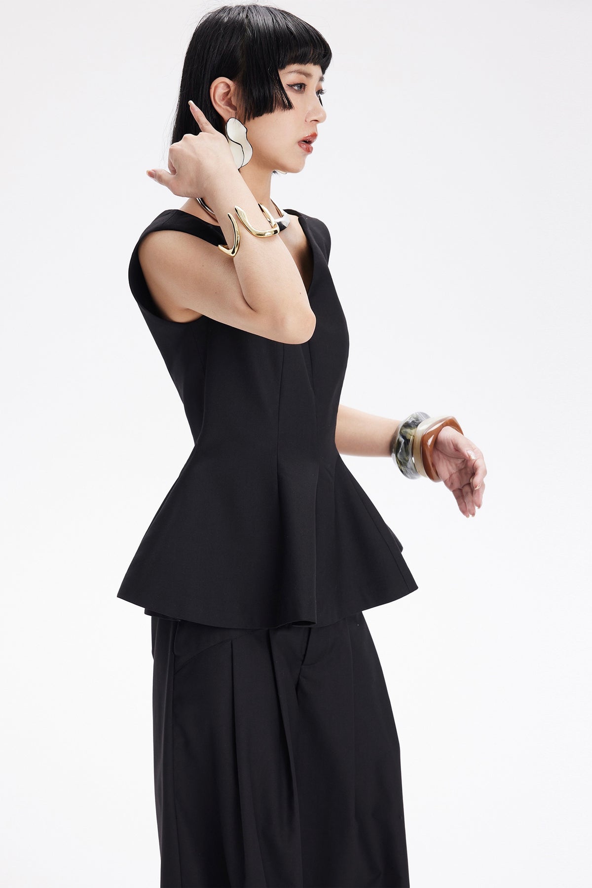 TINY IN STUDIO Sculptural Flared-Hem Tank Top