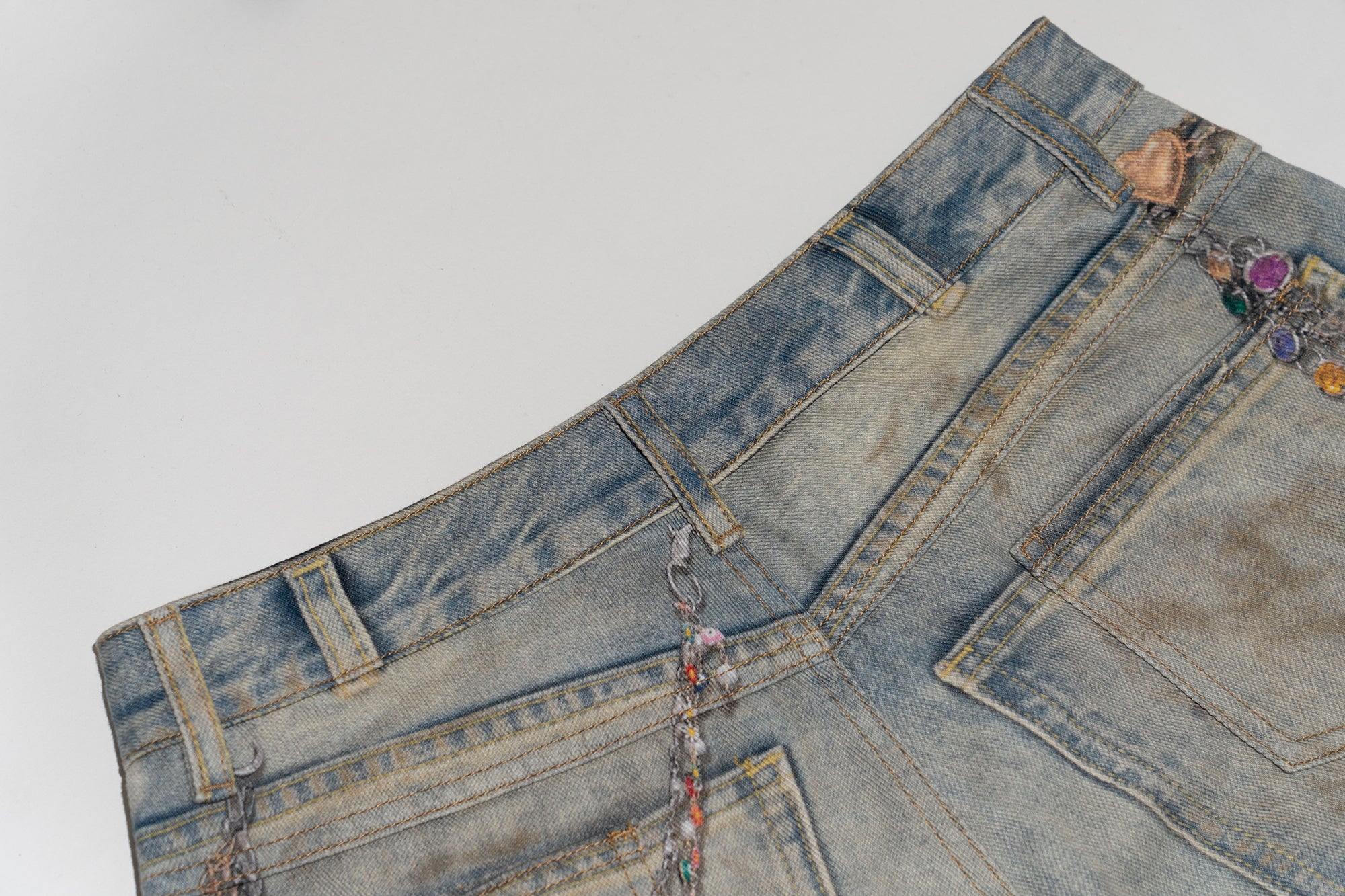 MOF Teddy Chain Graphic Distressed Curved Jeans