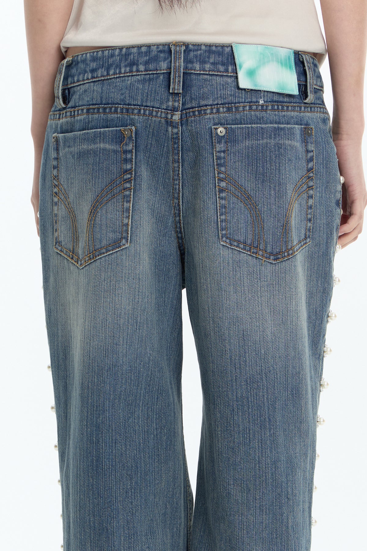 FAYCHUI Washed Floral Pearl Low-Rise Flared Jeans