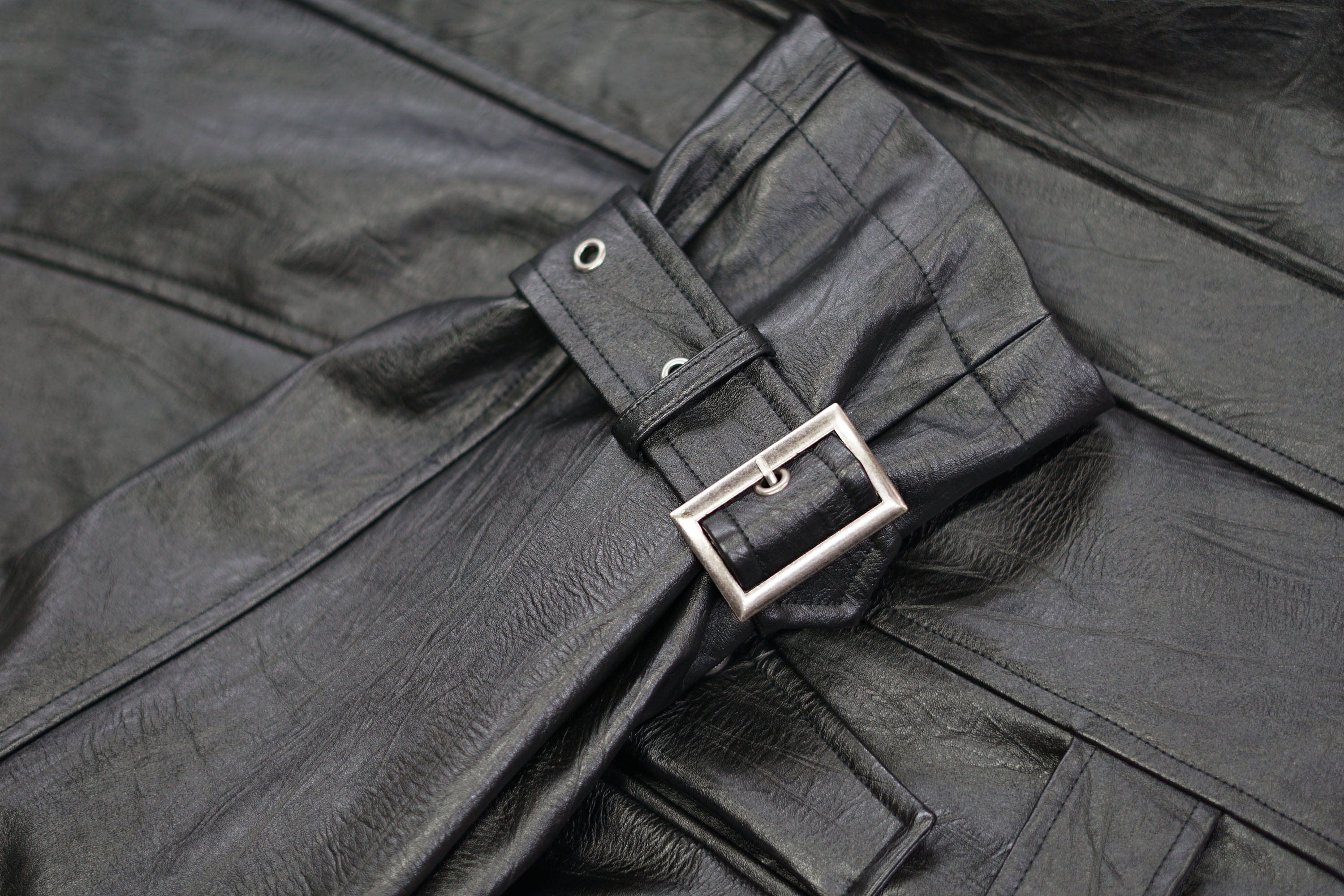 CESTNOUS Belted-Hem Faux Leather Jacket